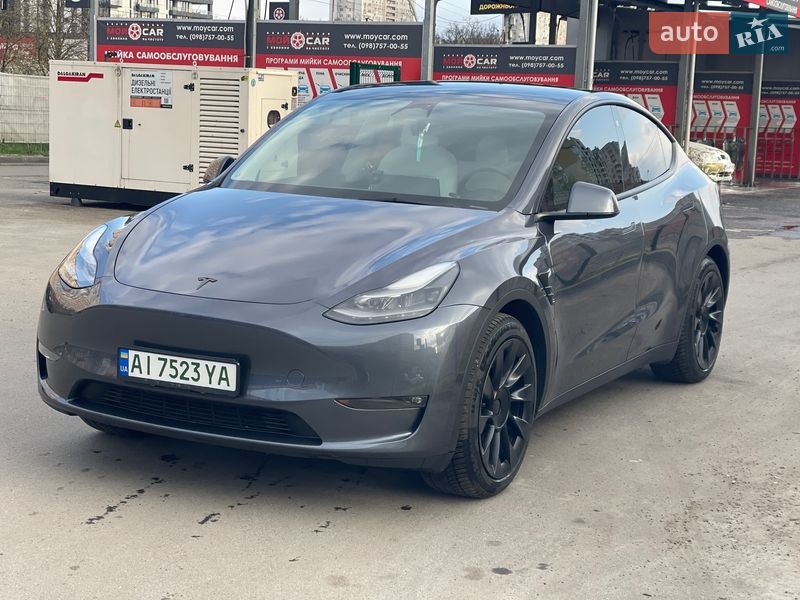 2022 Tesla Model Y, VIN 7SAYGDEE8PF627330:plate — фото 1 (autoria)