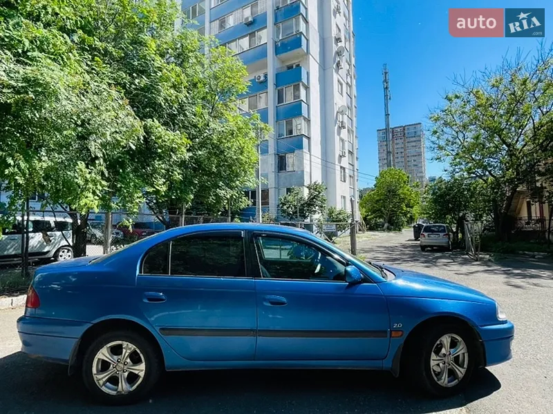 Toyota Avensis 1999 VIN SB153ABN10E051079 фото оголошення 12 з 44