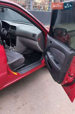 Хетчбек Toyota Corolla 1999 в 