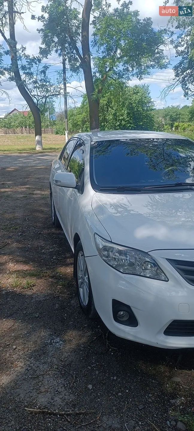 2011 Toyota Corolla - мініатюра 12