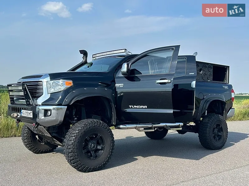 Toyota Tundra 2014 VIN 5TFUY5F13EX412659 фото оголошення 12 з 93