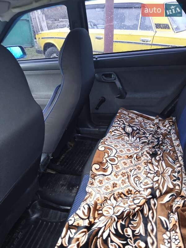 Хэтчбек ВАЗ / Lada 2112 2006 в Тальном фото 10 Хэтчбек ВАЗ / Lada 2112 2006 в Тальном