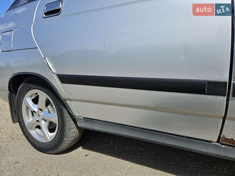 Хэтчбек ВАЗ / Lada 2112 2003 в Помошной фото 46 Хэтчбек ВАЗ / Lada 2112 2003 в Помошной