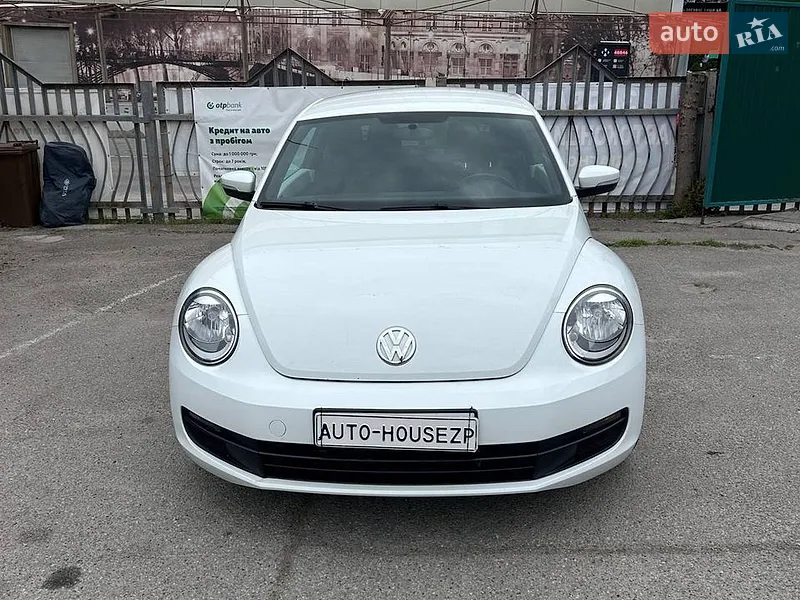 Volkswagen Beetle 2013 VIN 3VWJ07AT6EM633657 фото оголошення 2 з 63