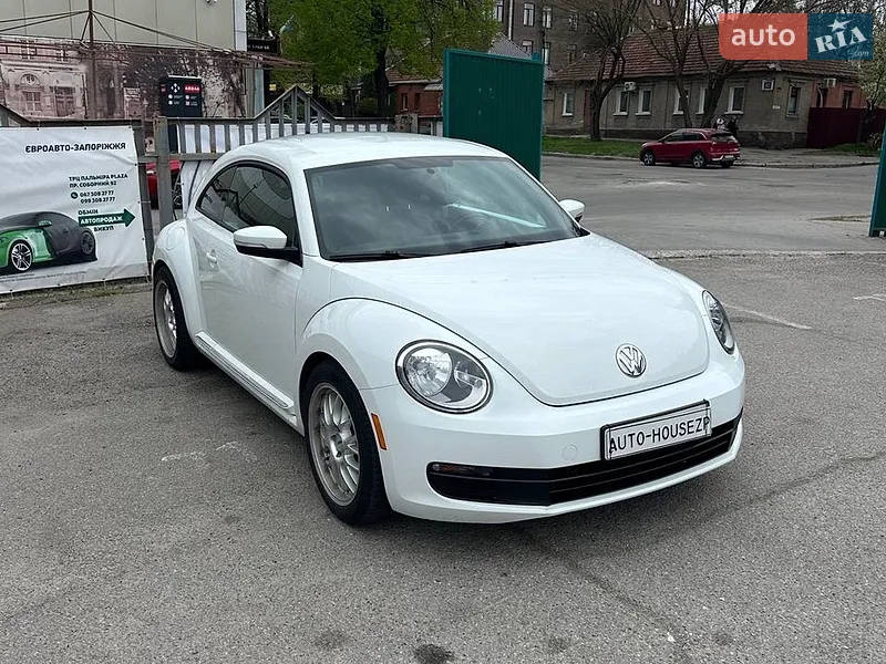 Volkswagen Beetle 2013 VIN 3VWJ07AT6EM633657 фото оголошення 3 з 63