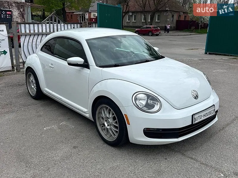 Volkswagen Beetle 2013 VIN 3VWJ07AT6EM633657 фото оголошення 9 з 63