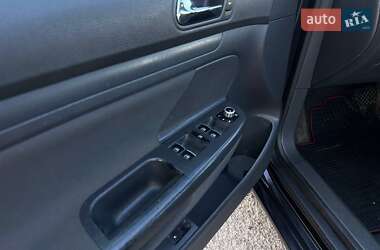 Хетчбек Volkswagen Golf 2004 в 