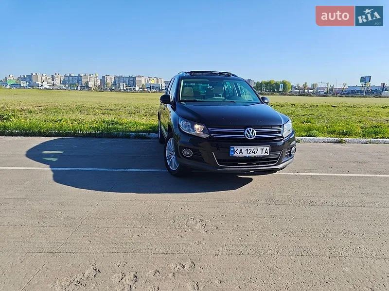 Volkswagen Tiguan 2013 VIN WVGBV3AX9EW541104 фото оголошення 30 з 77