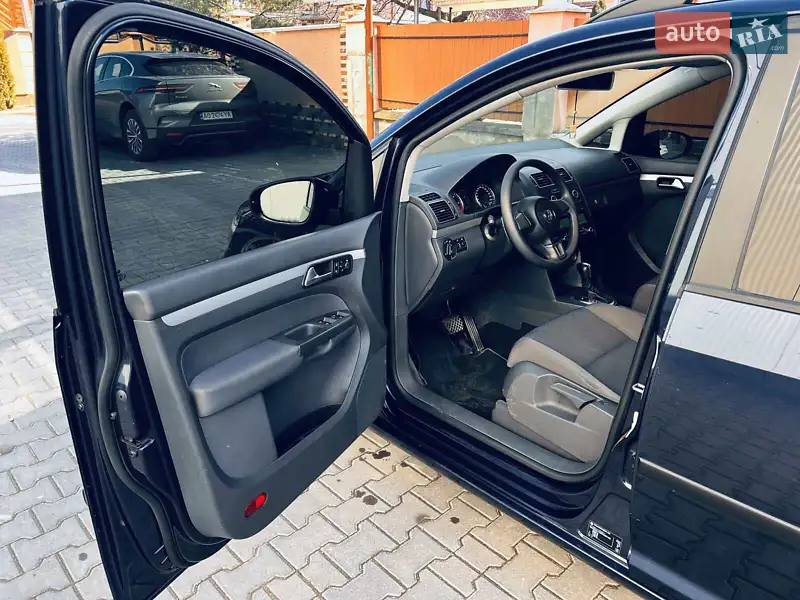 Volkswagen Touran 2014 VIN WVGZZZ1TZFW020102 фото оголошення 4 з 52