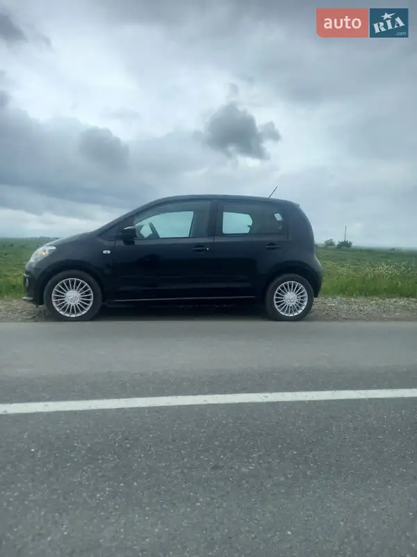 Volkswagen Up 2014 VIN WVWZZZAAZED128139 фото оголошення 2 з 62