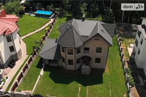 Продается дом на 2 этажа 295 кв. м с бассейном