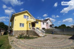 Продается дом на 2 этажа 240 кв. м с гаражом