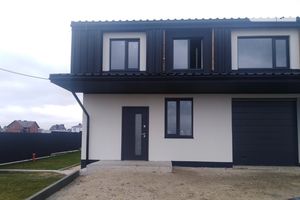 Продается дом на 2 этажа 162 кв. м с гаражом