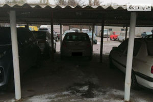 Продается место на стоянке под легковое авто на 11 кв. м